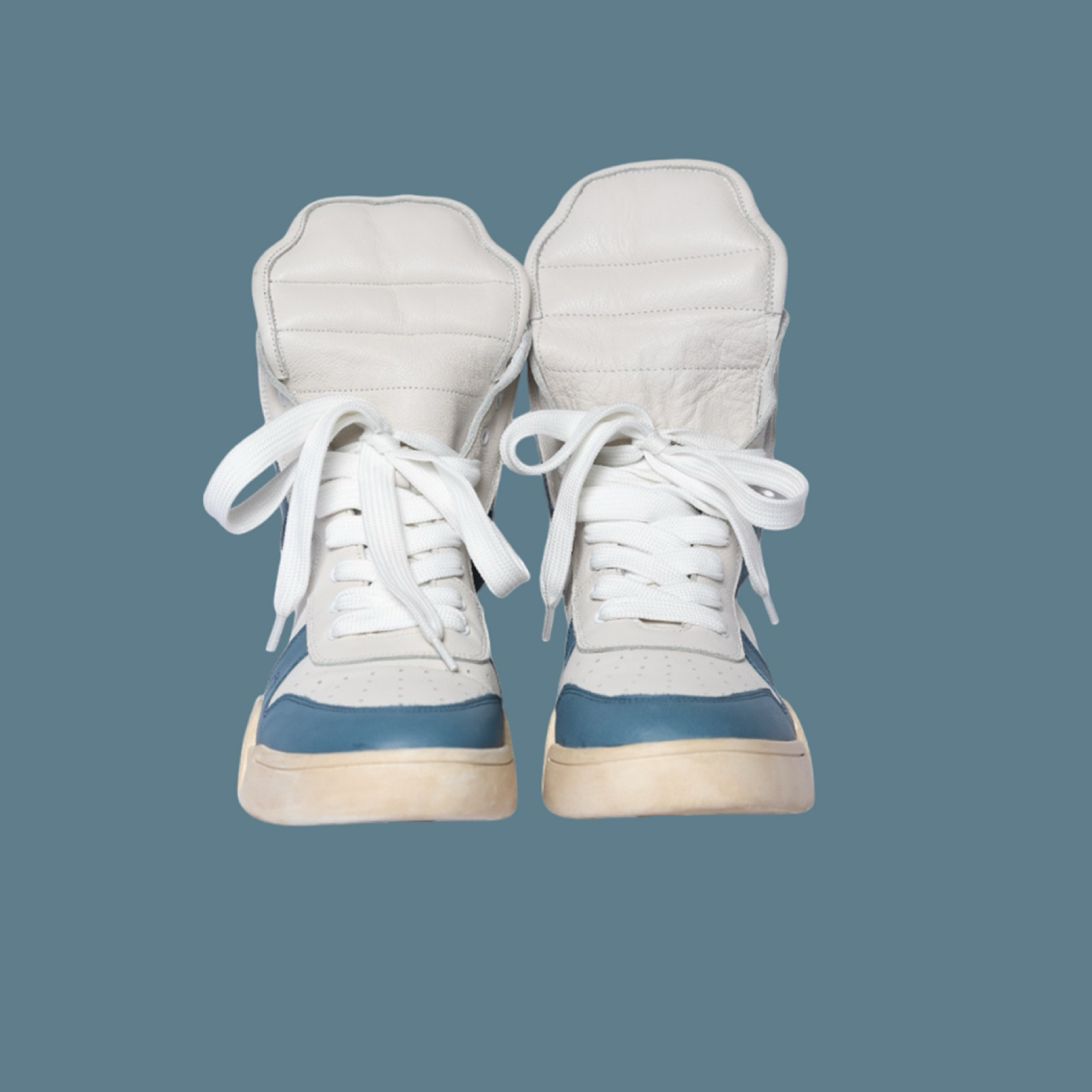 Cyan white high-top leather sneaker by Chaun Collins — front view